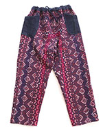 オールドラリーキルトのテーパードパンツ